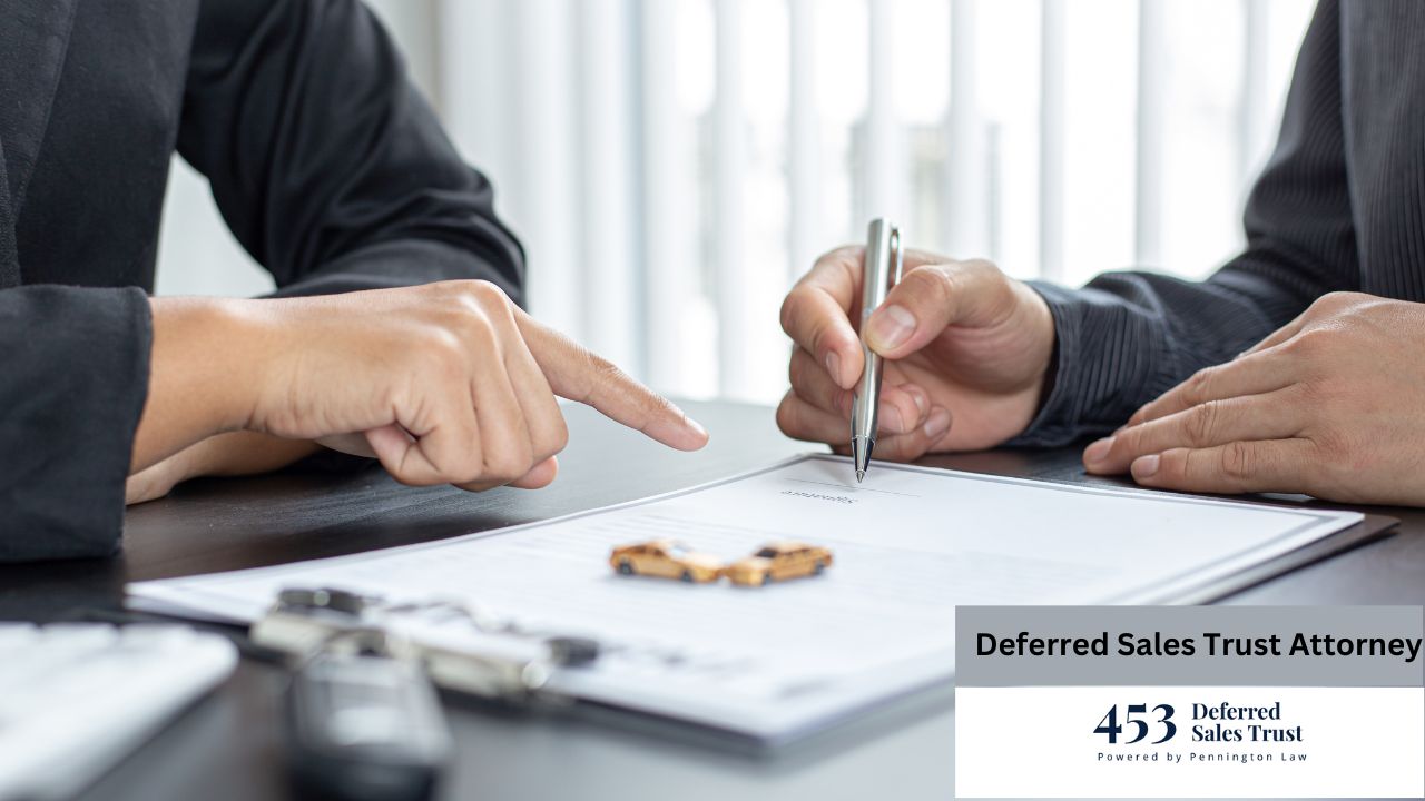 Two individuals are engaged in a serious business transaction, as one signs a legal document while the other points to a specific section, suggesting a car sale or related agreement.
